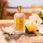 4711 Acqua Colonia Starfruit & White Flowers zwischen Sternfrüchten und weißen Blüten